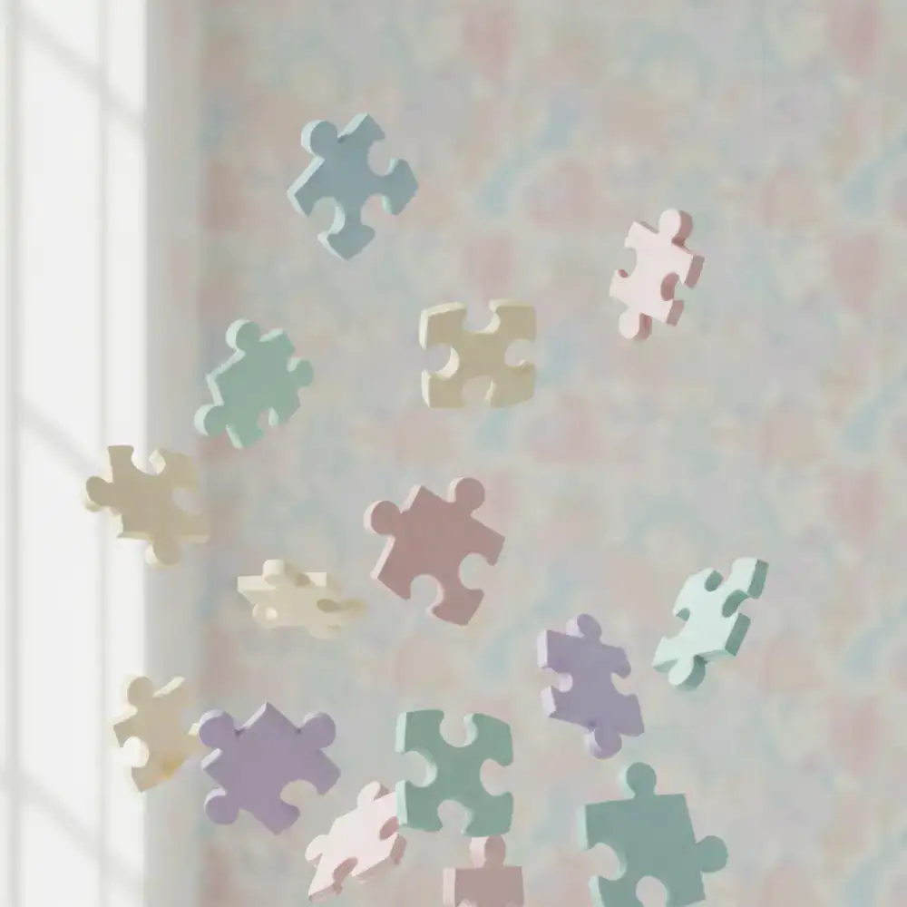 Soft pastel puzzle pieces floating in a subtle background pattern